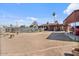 Expansive backyard featuring a pool, slide, patio, and ample space for outdoor activities at 2319 N 71St Dr, Phoenix, AZ 85035
