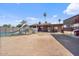 Expansive backyard featuring a pool, slide, patio, and ample space for outdoor activities at 2319 N 71St Dr, Phoenix, AZ 85035