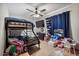 A room for sleep and storage features a bunk bed with an entertainment center for movies and shoes at 2319 N 71St Dr, Phoenix, AZ 85035