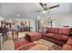 Cozy living room with an open floor plan that flows into the kitchen at 2319 N 71St Dr, Phoenix, AZ 85035