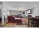 Open-concept living room featuring neutral tones and cozy seating area at 2319 N 71St Dr, Phoenix, AZ 85035