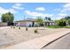 Beautiful home with a two-car garage, gravel landscaping, and a well-maintained lawn at 2712 N 20Th Dr, Phoenix, AZ 85009