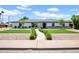 Charming home with a well-manicured front yard, new grass, and a welcoming walkway at 2712 N 20Th Dr, Phoenix, AZ 85009