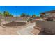 Spacious backyard featuring a trampoline, built-in grill, and a versatile space for outdoor fun at 3016 W White Canyon Rd, San Tan Valley, AZ 85144
