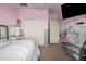 A bedroom featuring light pink walls, carpet flooring, and closet and furnishings at 3016 W White Canyon Rd, San Tan Valley, AZ 85144