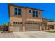 Two-story home with three-car garage and easy-care landscaping at 3016 W White Canyon Rd, San Tan Valley, AZ 85144