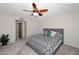 Bedroom featuring a ceiling fan and a closet out of frame at 3033 W Tierra Buena Ln, Phoenix, AZ 85053