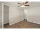 Bedroom featuring a ceiling fan, and a closet at 320 E Mckellips Rd # 245, Mesa, AZ 85201