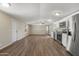 An open living space featuring durable floors, plenty of natural light, and neutral-colored walls at 320 E Mckellips Rd # 245, Mesa, AZ 85201