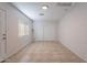 Spacious room with neutral paint, tiled floors, large closet and window at 3423 W Bloomfield Rd, Phoenix, AZ 85029