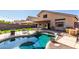 Backyard with private pool, lounging area, and covered patio is perfect for outdoor enjoyment at 3619 N 104Th Dr, Avondale, AZ 85392