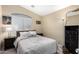 Cozy bedroom with natural light, a calming color scheme, and neutral carpet at 3619 N 104Th Dr, Avondale, AZ 85392
