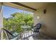 Charming balcony with seating and views of lush greenery at 4201 E Camelback Rd # 74, Phoenix, AZ 85018