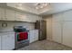 Kitchen featuring white cabinets and stainless steel appliances at 4201 E Camelback Rd # 74, Phoenix, AZ 85018