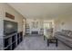 Spacious living room with neutral walls, carpet flooring, and lots of natural light at 4201 E Camelback Rd # 74, Phoenix, AZ 85018