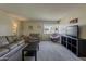 Living room with neutral walls, carpet flooring, and lots of natural light at 4201 E Camelback Rd # 74, Phoenix, AZ 85018