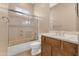 Cozy bathroom with shower-tub combination and wood vanity offers functionality at 42122 N Anthem Springs Rd, Anthem, AZ 85086