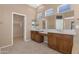 Bright bathroom with double sinks and vanity space offers ample room at 42122 N Anthem Springs Rd, Anthem, AZ 85086