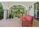 Inviting covered patio with comfortable seating and lush greenery, perfect for relaxation at 5225 N 23Rd St, Phoenix, AZ 85016