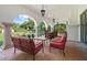 Spacious covered patio offering multiple seating areas and views of the beautifully landscaped yard at 5225 N 23Rd St, Phoenix, AZ 85016