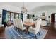 Elegant dining room featuring vaulted ceilings, chandelier, and ample seating at 5225 N 23Rd St, Phoenix, AZ 85016