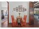 Cozy entryway with decorative art, hardwood floors, and comfortable seating at 5225 N 23Rd St, Phoenix, AZ 85016