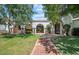 Charming front entrance with a brick walkway, arched entryway, and well-maintained landscaping, exuding curb appeal at 5225 N 23Rd St, Phoenix, AZ 85016
