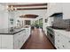 Stylish kitchen with an island, range oven, and seamless flow to the adjacent living spaces at 5225 N 23Rd St, Phoenix, AZ 85016