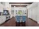 Well-equipped kitchen featuring a central island, custom cabinets, and hardwood floors at 5225 N 23Rd St, Phoenix, AZ 85016
