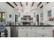 Kitchen island showcasing pendant lighting, ample storage, and elegant countertops at 5225 N 23Rd St, Phoenix, AZ 85016