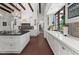 Open-concept kitchen with a center island, tiled backsplash, and bright countertops at 5225 N 23Rd St, Phoenix, AZ 85016