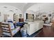 Open-concept living room with high ceilings, hardwood floors, and tasteful decor at 5225 N 23Rd St, Phoenix, AZ 85016