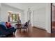 Inviting living room with hardwood floors, arched entrance, and window seat at 5225 N 23Rd St, Phoenix, AZ 85016