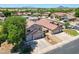 Stunning two-story home with mountain views and lush green trees at 5744 E Jacaranda St, Mesa, AZ 85205