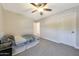 Comfortable bedroom featuring neutral paint, carpeted floor, ceiling fan, and a bed at 5744 E Jacaranda St, Mesa, AZ 85205