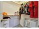 Walk-in closet with built-in shelving, clothes rack, and a full-length mirror at 5744 E Jacaranda St, Mesa, AZ 85205