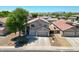 Well-maintained two-story home with a three-car garage, set in a quiet neighborhood at 5744 E Jacaranda St, Mesa, AZ 85205