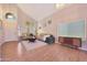 Inviting living room with wood floors, ample natural light, and a seamless flow into other living spaces at 5744 E Jacaranda St, Mesa, AZ 85205