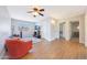 Spacious living room featuring wood floors, natural light, and an inviting atmosphere at 5744 E Jacaranda St, Mesa, AZ 85205