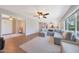 Open-concept living room with wood floors and comfortable seating at 5744 E Jacaranda St, Mesa, AZ 85205