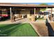 Spacious backyard with covered patio, outdoor seating, and low-maintenance landscape at 5801 N 73Rd Ave, Glendale, AZ 85303