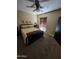 Bedroom with carpeted floors, minimalist decor and neutral color palette at 5801 N 73Rd Ave, Glendale, AZ 85303