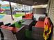 Charming covered patio with cozy seating, outdoor grill, and relaxing atmosphere at 5801 N 73Rd Ave, Glendale, AZ 85303