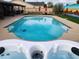 Inviting backyard pool and spa with desert mural wall art, perfect for outdoor relaxation and entertaining at 5801 N 73Rd Ave, Glendale, AZ 85303