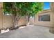 Private outdoor space with mature trees, offering a serene and relaxing environment at 5813 W Gelding Dr, Glendale, AZ 85306