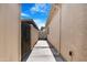 Private courtyard area with gated entrance, offering an outdoor living space at 5813 W Gelding Dr, Glendale, AZ 85306