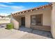 Inviting front exterior of home featuring a charming entrance and well-maintained landscaping at 5813 W Gelding Dr, Glendale, AZ 85306