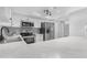 Bright kitchen featuring white cabinetry, stainless steel appliances, and a spacious marble countertop at 5813 W Gelding Dr, Glendale, AZ 85306