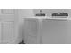Clean laundry room featuring modern appliances, providing convenience and efficiency at 5813 W Gelding Dr, Glendale, AZ 85306
