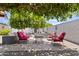 Cozy backyard seating area with comfortable cushions, perfect for relaxing outdoors at 6263 E Duncan St, Mesa, AZ 85205